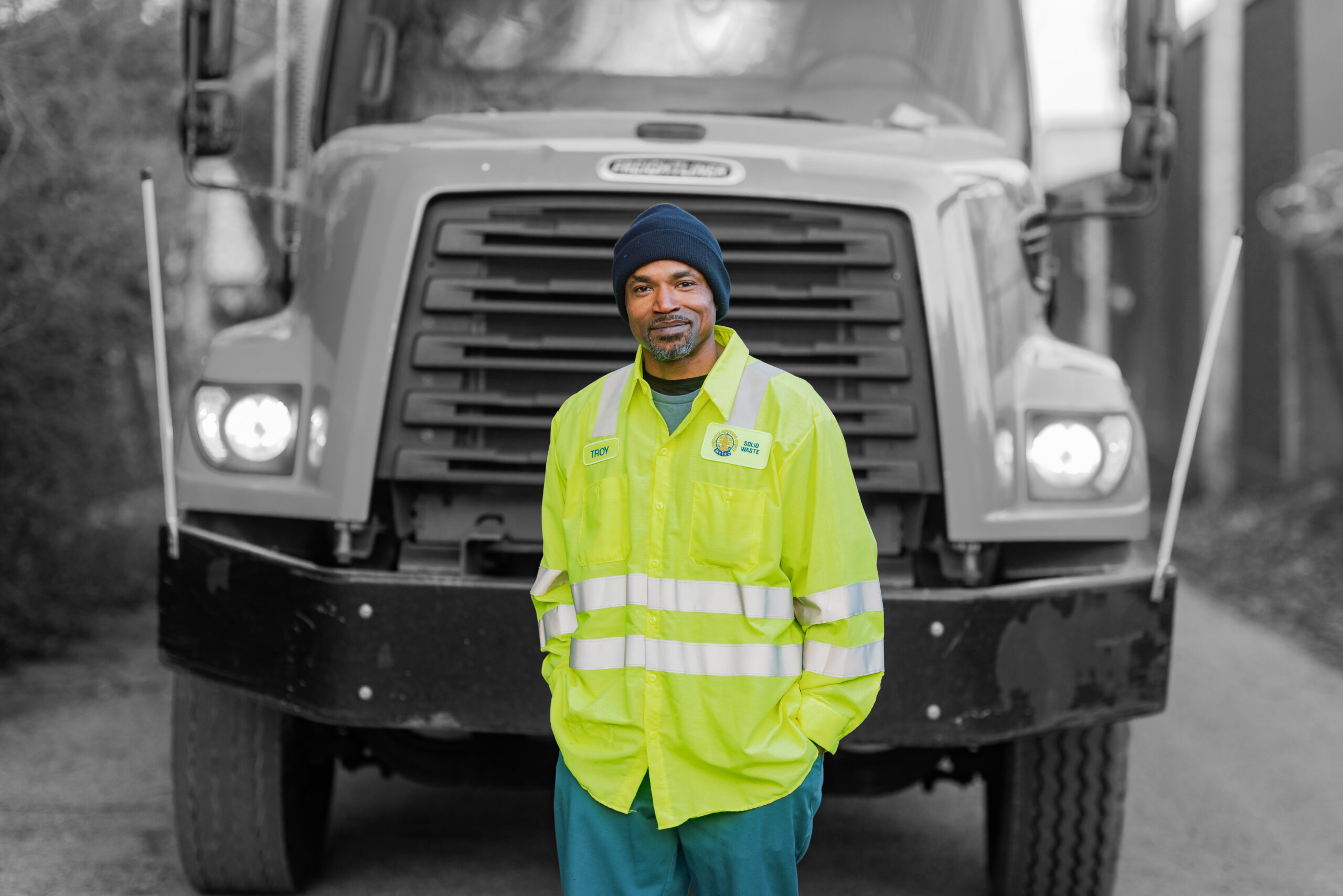 A portrait of a waste reduction employee