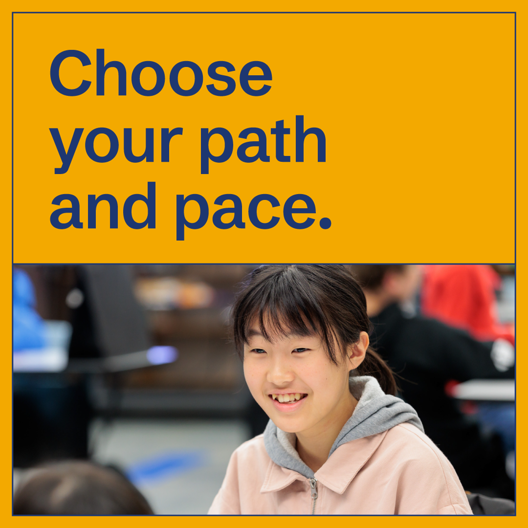 A smiling student sits in a classroom. Above her, bold blue text on a yellow background reads, Choose your path and pace. Other students are blurred in the background.