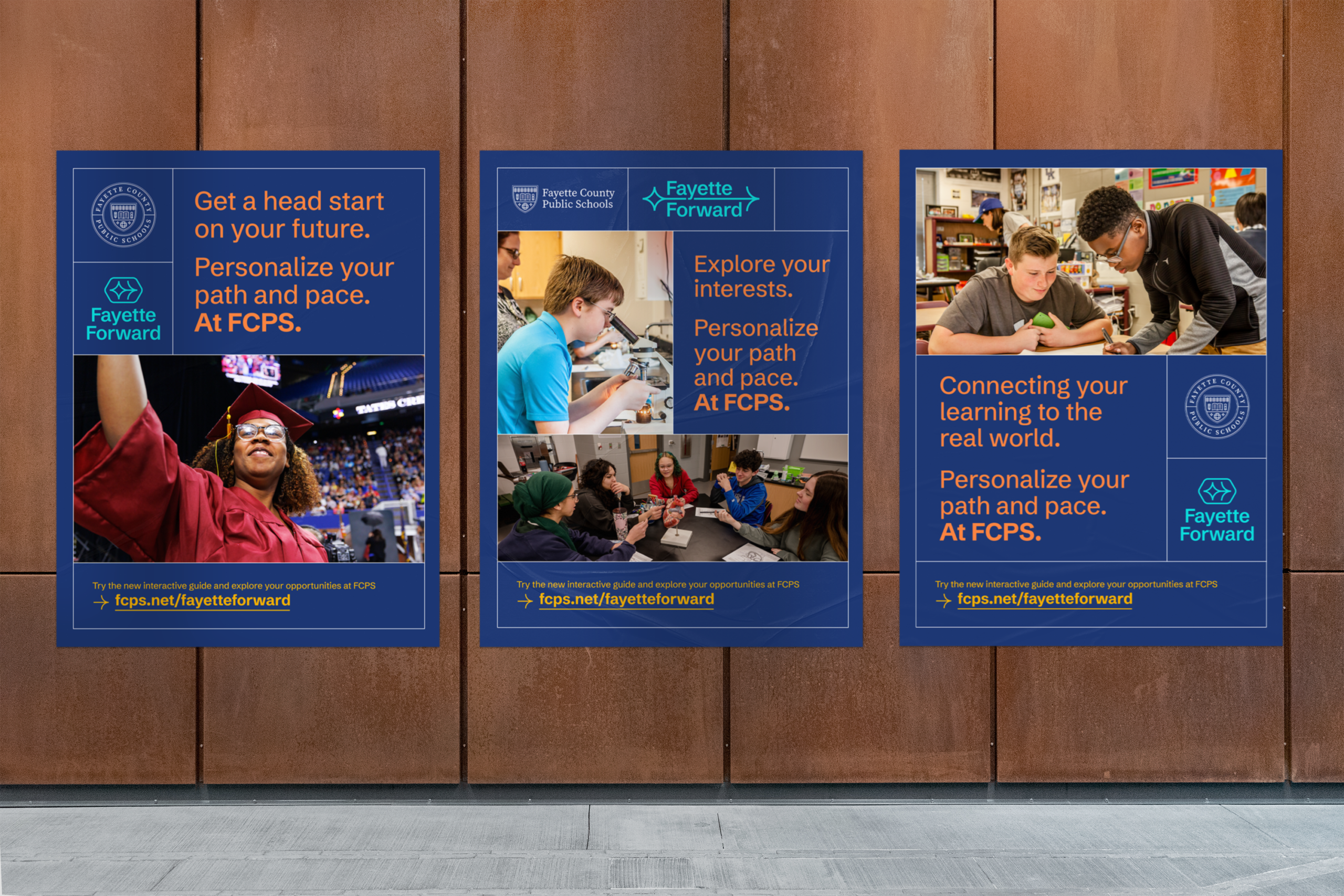 Three Fayette County Public Schools posters on a wall promote Fayette Forward with images of students learning and text encouraging students to personalize their path and pace for future, interests, and real-world learning.